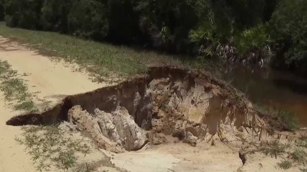 Residents in Lehigh Acres say potholes on dirt roads are getting worse cover image